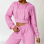 The model wearing Pink Malibu Long-sleeved Sweater - NUFIT STORE front view slimming shaper tight lifting jumpsuit romper leggings bodysuit yoga outfit set