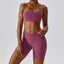 The model wearing Crimson Purple Valencia Yoga Clothing Sets Athletic Wear High Waist Shorts & Sports Bra - NUFIT STORE slimming shaper tight lifting jumpsuit romper leggings bodysuit yoga outfit set