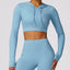 The model wearing Haze Blue Jamaica Yoga Long sleeved Crop Top - NUFIT STORE slimming shaper tight lifting jumpsuit romper leggings bodysuit yoga outfit set