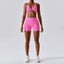 The model wearing Pink Powder Set Wynwood Seamless Yoga Set Fitness Sports Bra High Waist Shorts - NUFIT STORE slimming shaper tight lifting jumpsuit romper leggings bodysuit yoga outfit set