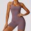 The model wearing Dousha Purple Bali Yoga Jumpsuits - NUFIT STORE slimming shaper tight lifting jumpsuit romper leggings bodysuit yoga outfit set