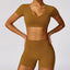 The model wearing Ginkgo Brown Set Morocco Yoga Sets Crop Top & Stretch Shorts - NUFIT STORE slimming shaper tight lifting jumpsuit romper leggings bodysuit yoga outfit set