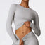 The model wearing Frost Grey Tribeca Long Sleeves - NUFIT STORE slimming shaper tight lifting jumpsuit romper leggings bodysuit yoga outfit set