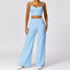 The model wearing Milk Blue Set Monaco Yoga Set Sports Crop Top & Pants - NUFIT STORE slimming shaper tight lifting jumpsuit romper leggings bodysuit yoga outfit set