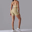 The model wearing Light Camel Maui Seamless Set Sports Bra & Shorts - NUFIT STORE slimming shaper tight lifting jumpsuit romper leggings bodysuit yoga outfit set