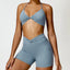 The model wearing Haze Blue Set Portofino Yoga Sets Sports Bra & Shorts - NUFIT STORE slimming shaper tight lifting jumpsuit romper leggings bodysuit yoga outfit set