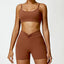 The model wearing Caramel Brown Set-4 Portofino Yoga Sets Sports Bra & Shorts - NUFIT STORE slimming shaper tight lifting jumpsuit romper leggings bodysuit yoga outfit set