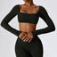 The model wearing Mojave Long Sleeved Crop Top slimming shaper tight lifting jumpsuit romper leggings bodysuit yoga outfit set