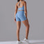 The model wearing Sky Blue Maui Seamless Set Sports Bra & Shorts - NUFIT STORE slimming shaper tight lifting jumpsuit romper leggings bodysuit yoga outfit set