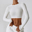 The model wearing White Brooklyn T-shirt Cotton Long Sleeve Sports Top - NUFIT STORE slimming shaper tight lifting jumpsuit romper leggings bodysuit yoga outfit set