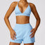 The model wearing Milk Blue Set Monaco Yoga Set Sports Bra & Shorts - NUFIT STORE slimming shaper tight lifting jumpsuit romper leggings bodysuit yoga outfit set