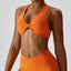 The model wearing Tropical Orange Valencia Yoga Athletic Wear Sports Bra - NUFIT STORE slimming shaper tight lifting jumpsuit romper leggings bodysuit yoga outfit set